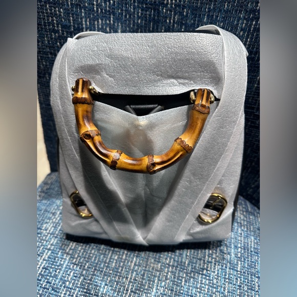 Gucci Black Leather Backpack with Gold Accents - Picture 7 of 12